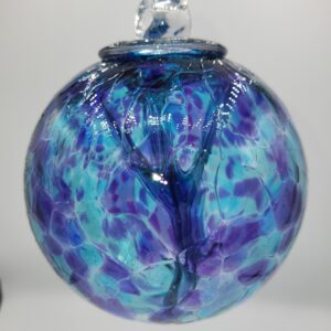 Blue and purple glass ornament with bubble design.