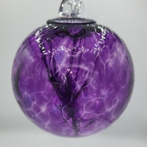 Close-up of a purple glass ornament.