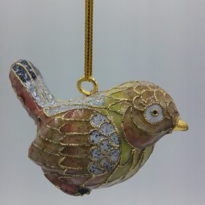 A decorative bird ornament with gold edging and pastel colors, including green, pink, blue, and yellow, hangs by a gold string against a plain, light background.