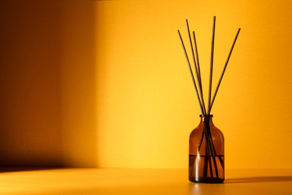 reed diffuser with a Brown bottle with reed sticks